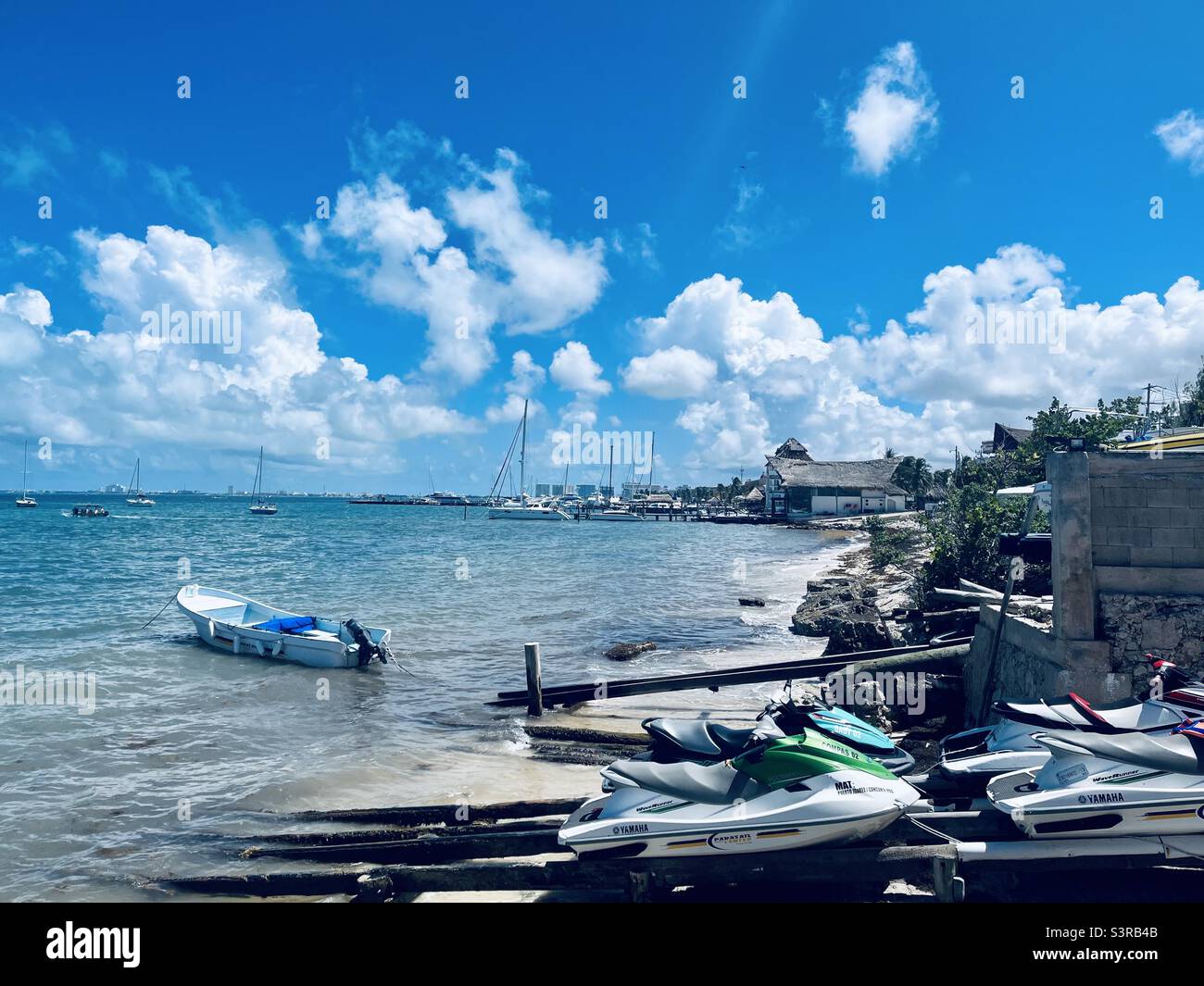 Watersport, boats and jet skis on the beach in Mexico - Smartphone Captured Stock Image