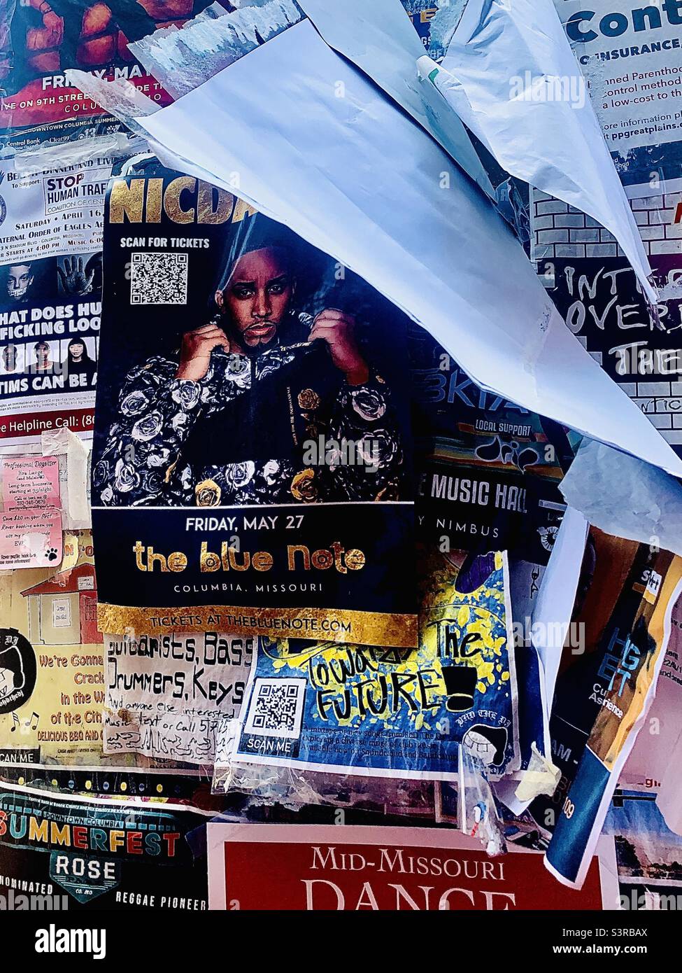 Colorful Community Board with Variety of Information Signs - Smartphone Captured Stock Image