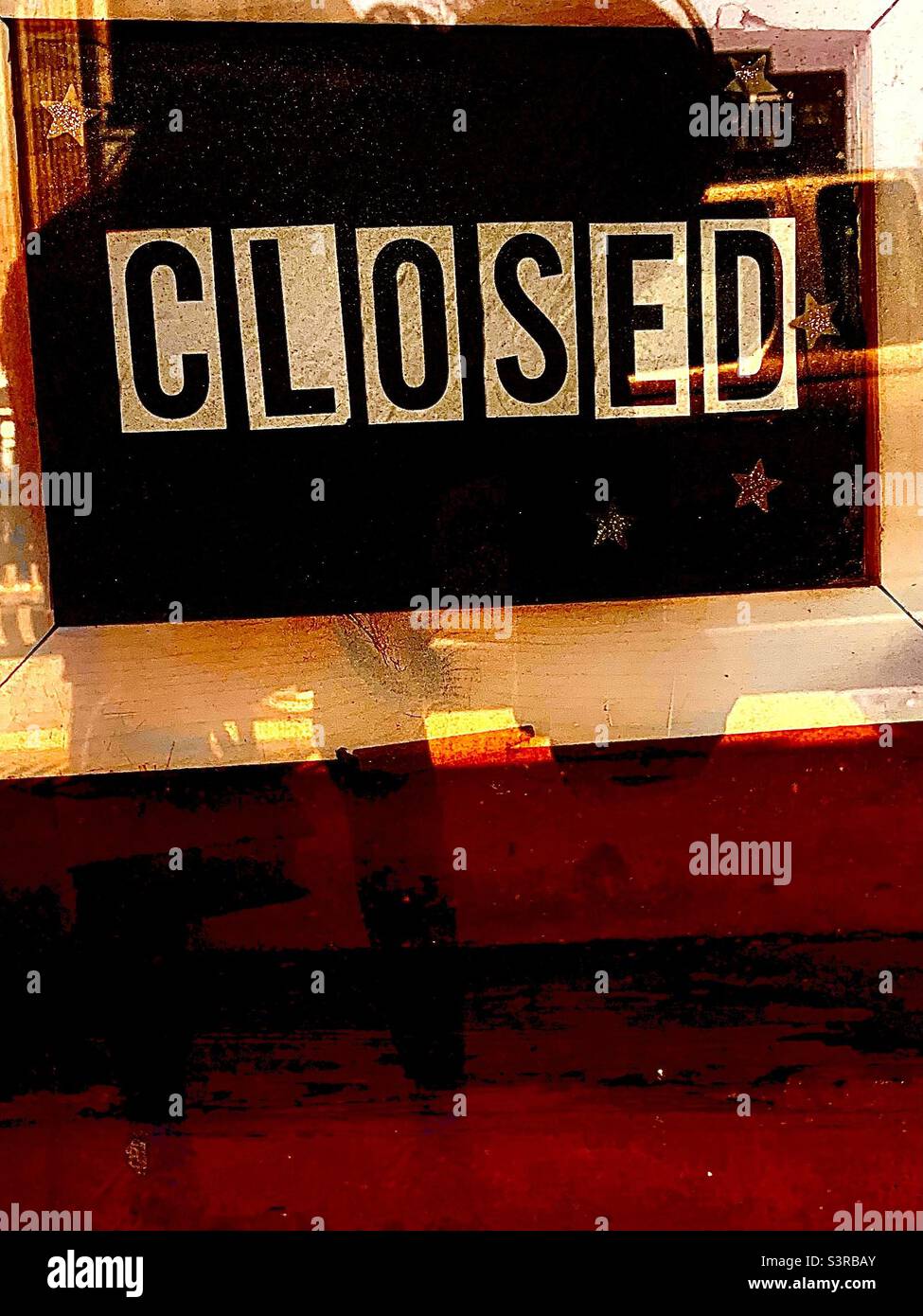 CLOSED Sign in Shop Window - Smartphone Captured Stock Image