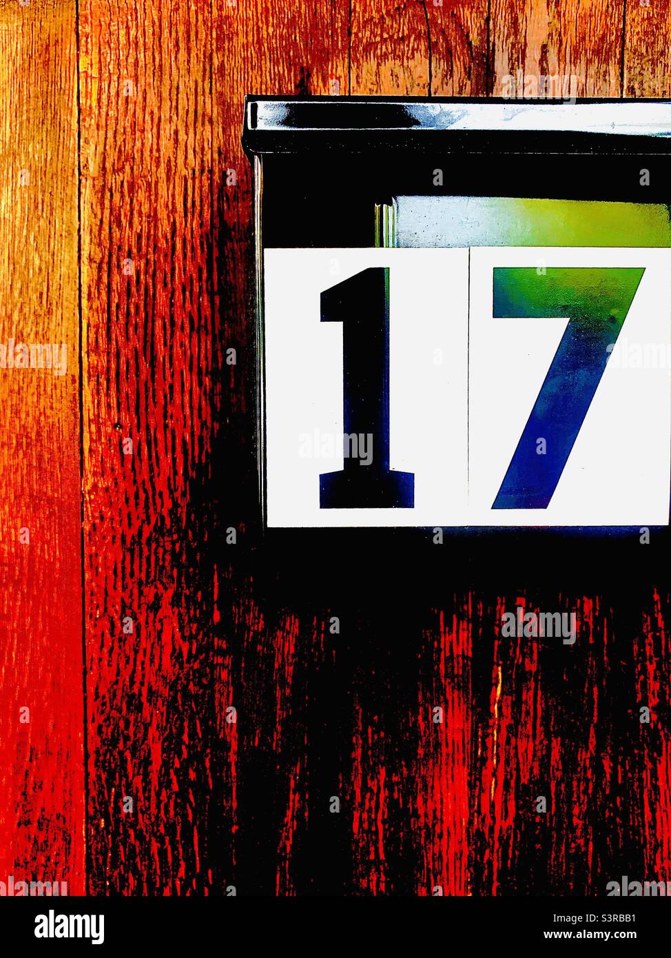 Graphic Colors Brown Door with Number 17 - Smartphone Captured Stock Image