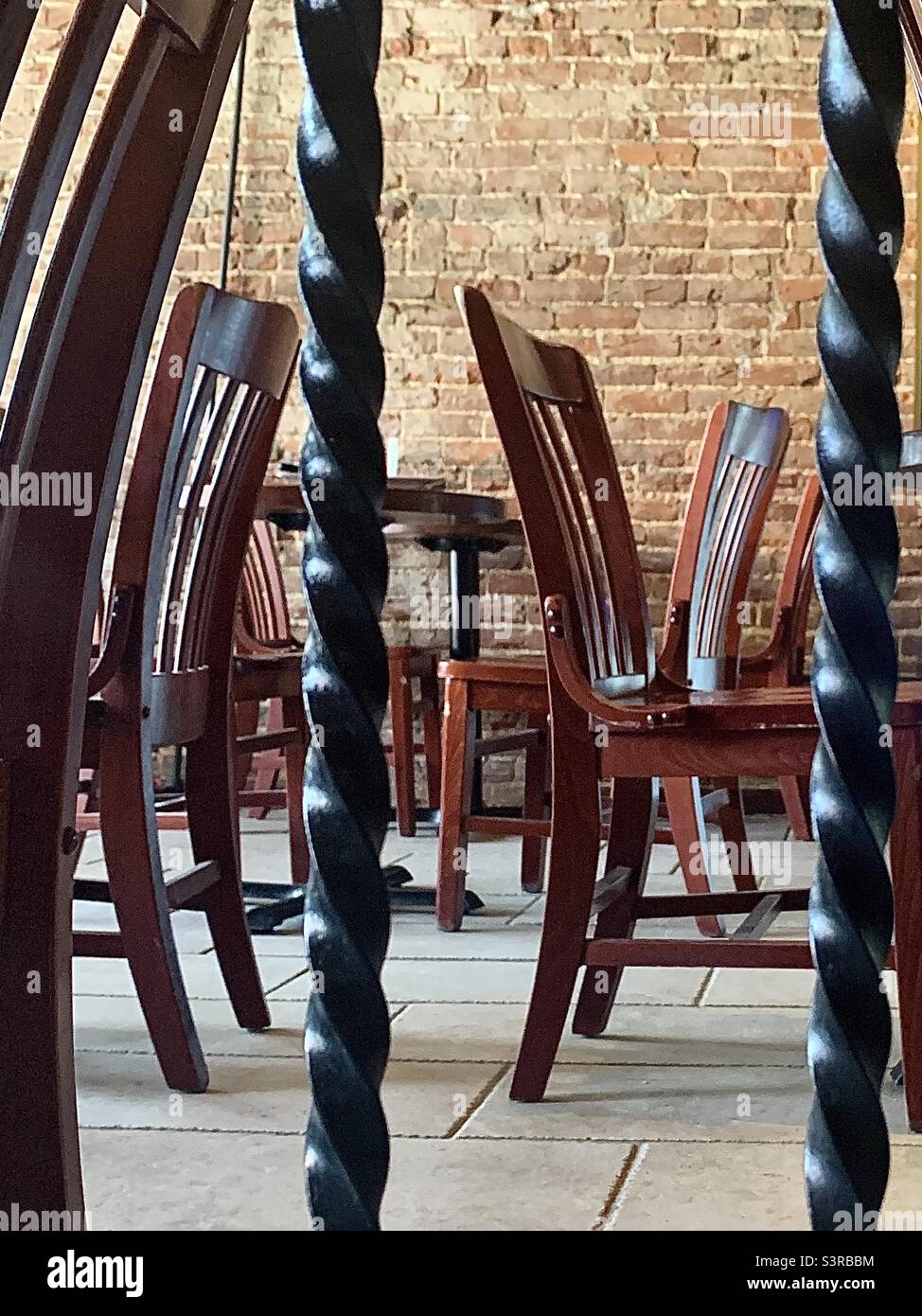 Interesting Perspective of Tables and Chairs Inside Coffee Shop - Smartphone Captured Stock Image