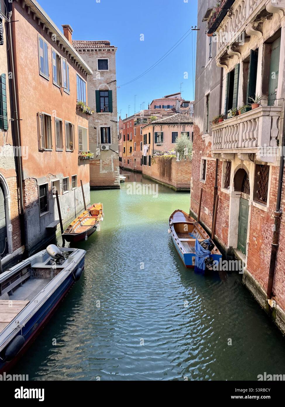Sun and shade on Venetian canal Stock Photo - Alamy