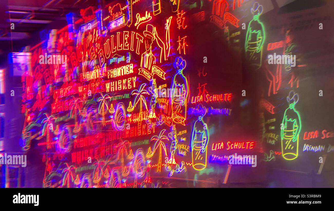 LOS ANGELES, CA, AUG 2021: abstract pattern created with prism viewing details of Bulleit Frontier Whiskey neon sign at Grand Central Market in Downtown - Smartphone Captured Stock Image