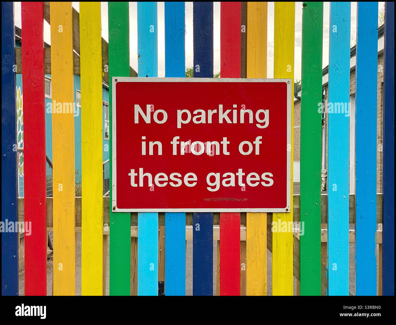 Even though it looks colourful “No Parking in front of these gates” please. Photo ©️ COLIN HOSKINS. Stock Photo