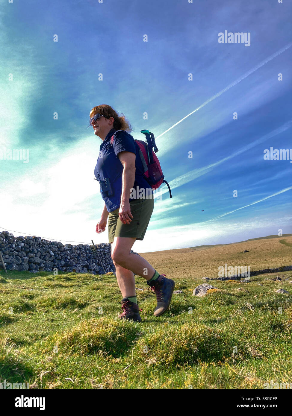 Woman hiking in the Yorkshire Dales Stock Photo