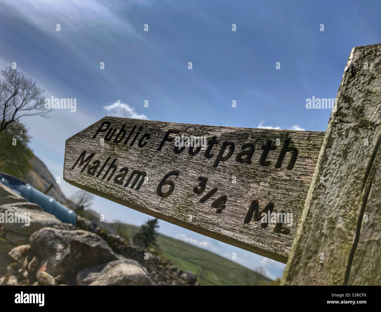 Public footpath sign to Malham Yorkshire Dales Stock Photo