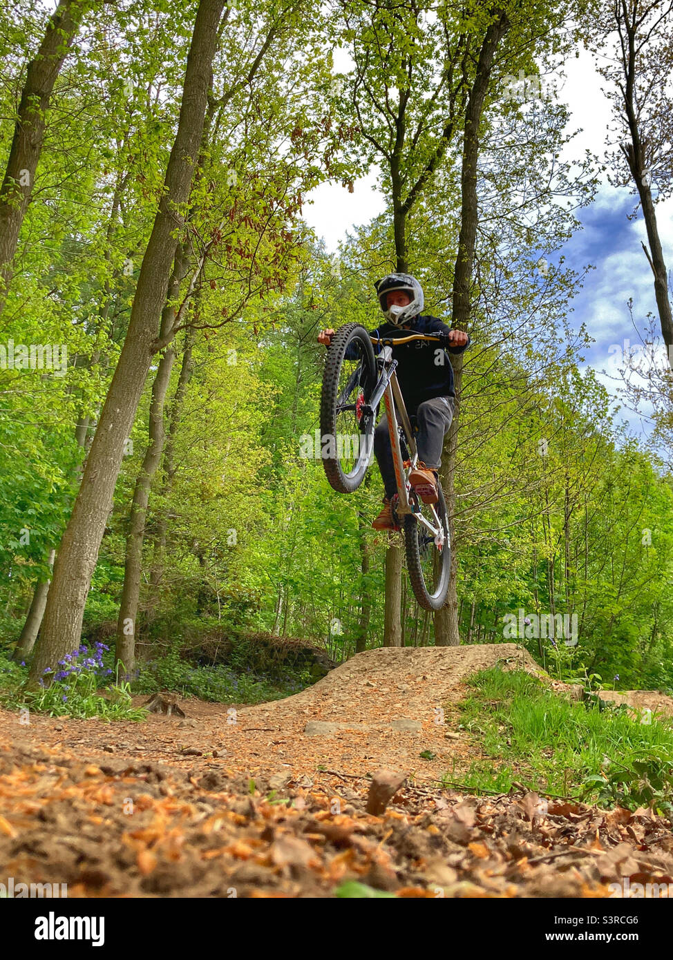 Mountain biker jumping Stock Photo