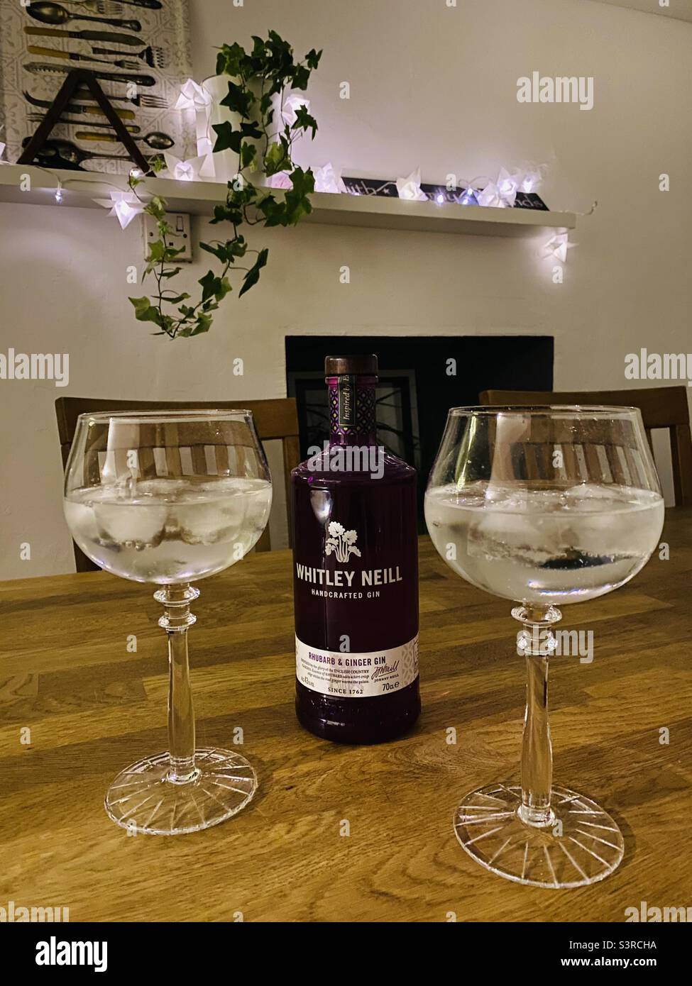Gin and Tonic whitley neill purple bottle Stock Photo Alamy