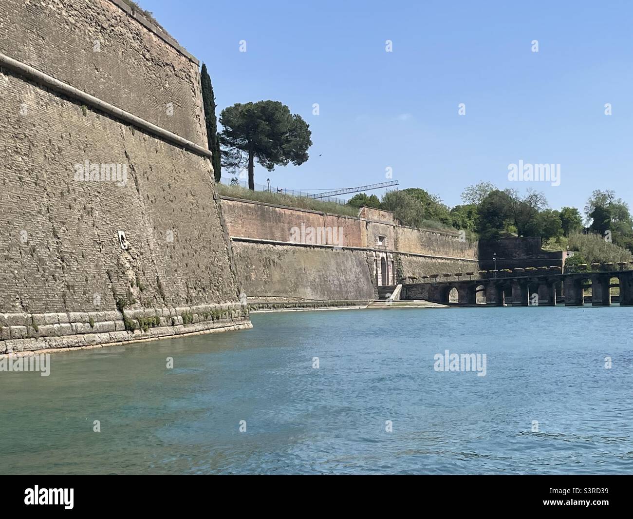 Giant city wall at Peschiera del Garda, Mincio River, Veneto, Italy Stock Photo
