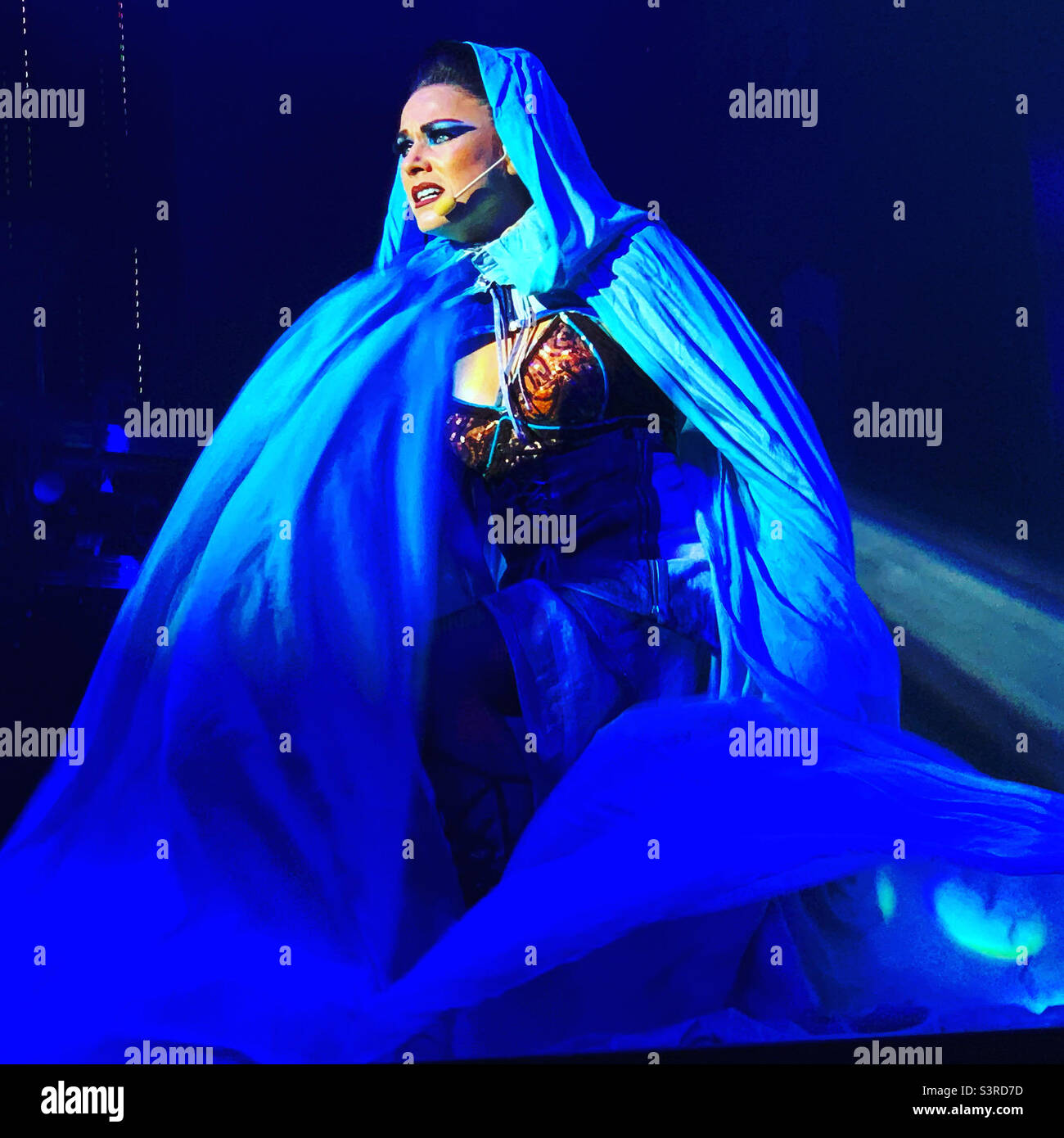 March, 2022, a woman performs in Playlist Productions’ Epic Rock show on board the Carnival Conquest during a cruise from Miami, Florida to the Bahamas - Smartphone Captured Stock Image