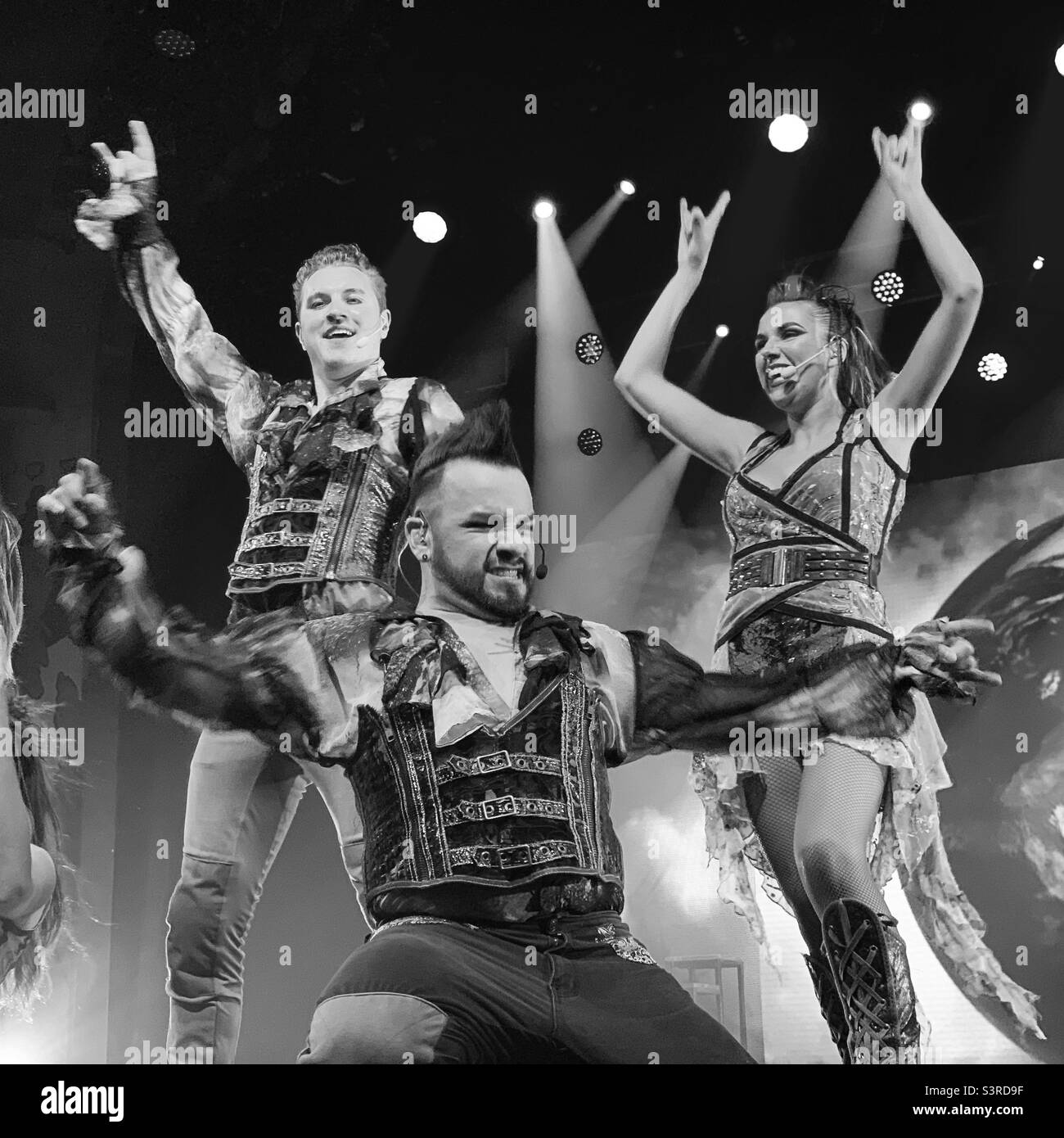 March, 2022, performers in Playlist Productions’ Epic Rock show on board the Carnival Conquest during a cruise from Miami, Florida to the Bahamas - Smartphone Captured Stock Image