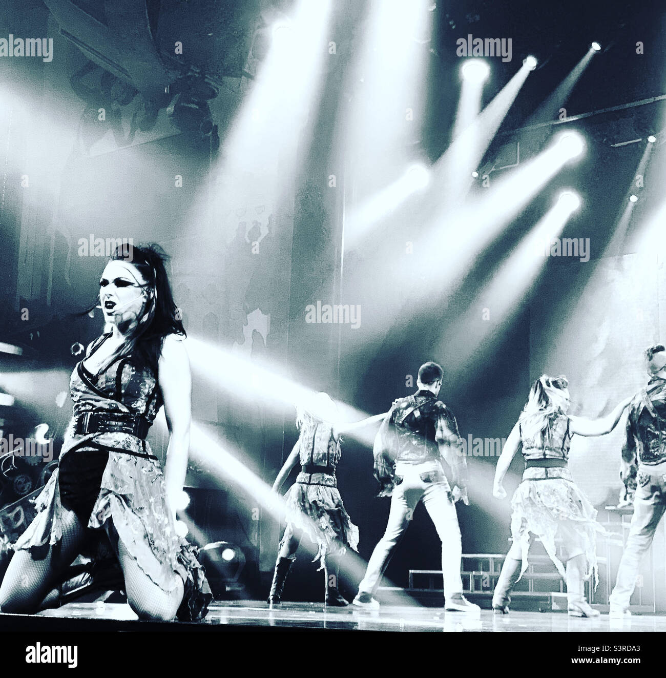 March, 2022, performers in Playlist Productions’ Epic Rock show on board the Carnival Conquest during a cruise from Miami, Florida to the Bahamas - Smartphone Captured Stock Image