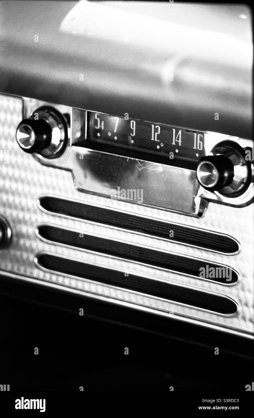 Studebaker B&W chrome push button radio innovation rear classic car transportation nostalgia Stock Photo