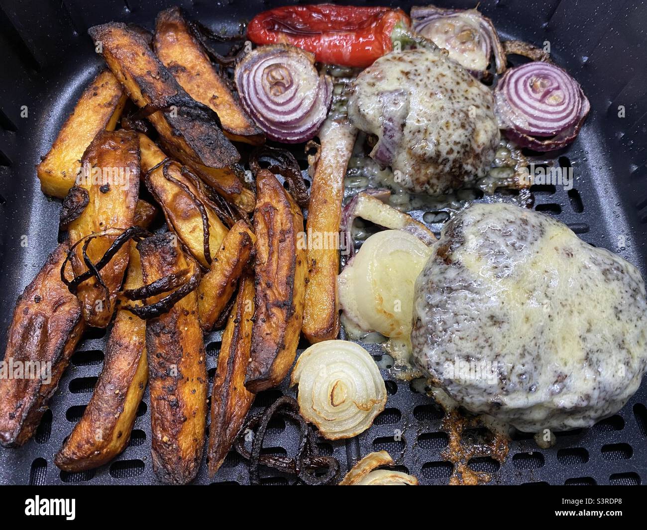 Air Fryer Cheese Burger with Onion a Fries - Smartphone Captured Stock Image