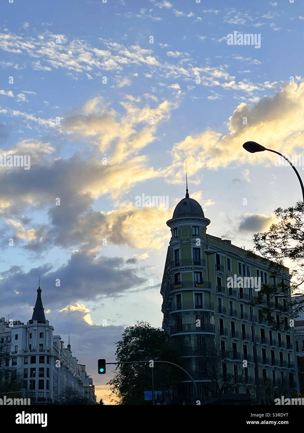 Cloudy sky at dawn. Alcala street, Madrid, Spain. - Smartphone Captured Stock Image