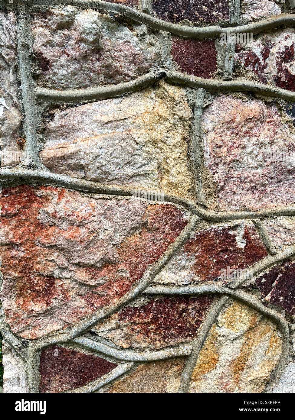 Grapevine joint grout style on the exterior of a masonry built house