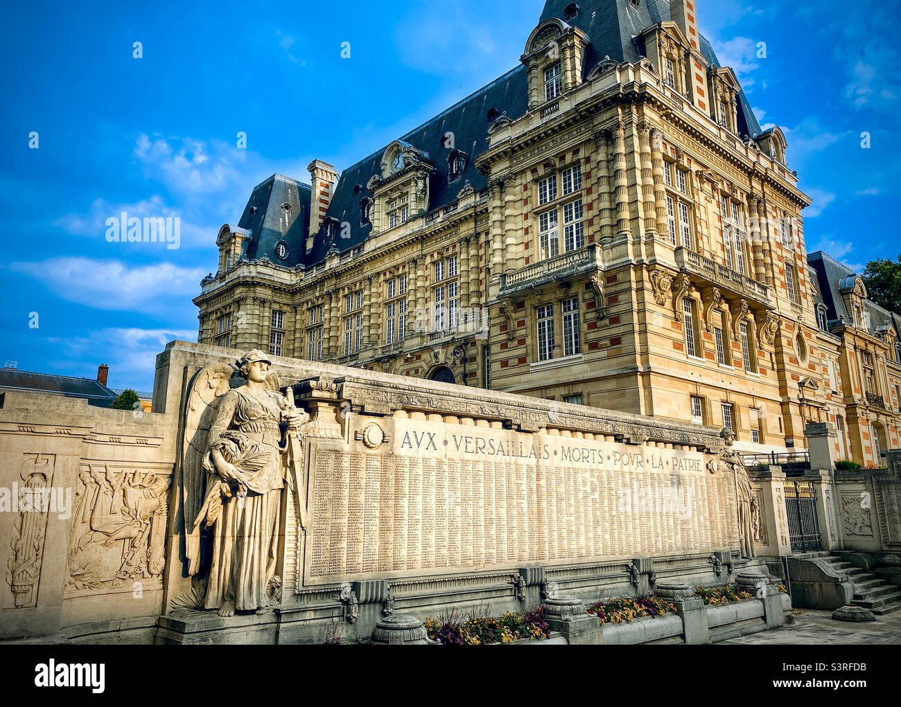 The War Memorial Wall at the historic Versailles Hotel de Ville (city hall) in Versailles, France - Smartphone Captured Stock Image