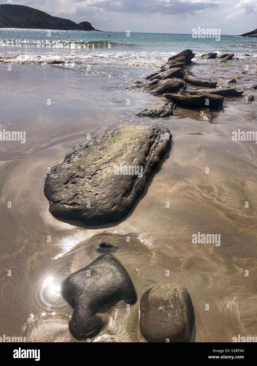 A rocky shoreline at Brava Beach in Buzios, Brazil. Stock Photo