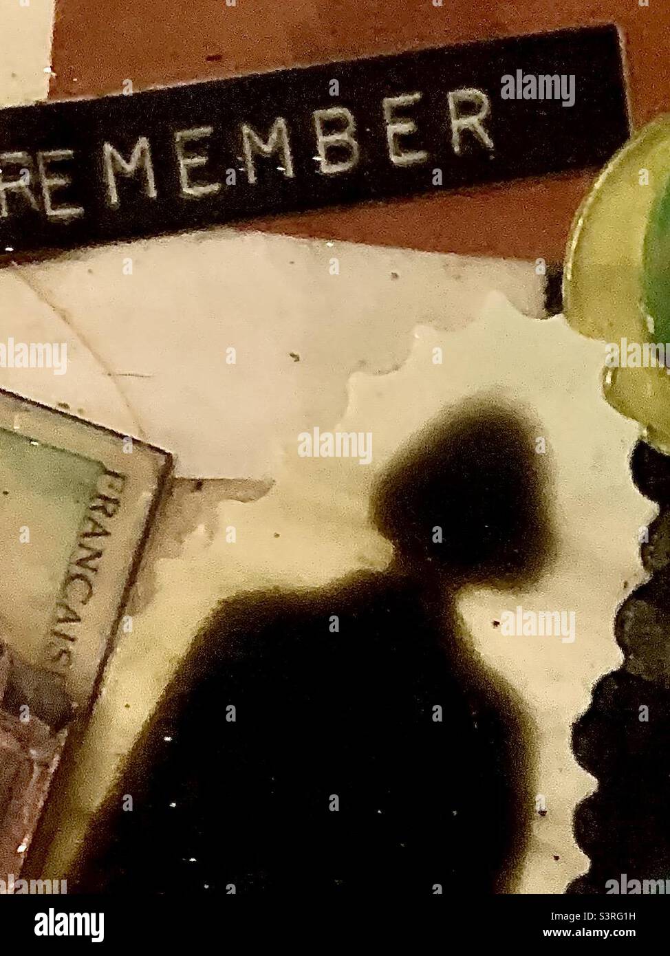 Eerie collage type photo of woman’s shadow , says REMEMBER - Smartphone Captured Stock Image