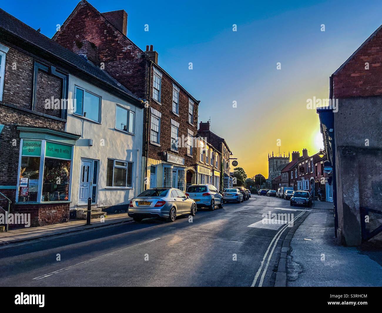 View down Market Place in Snaith village during sunset Stock Photo