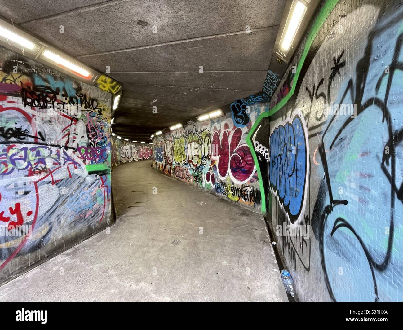 Subway under Victoria Street, Belfast. This subway connects High Street and Queen’s Square, curving around the foundations of the Albert Memorial Clock. - Smartphone Captured Stock Image