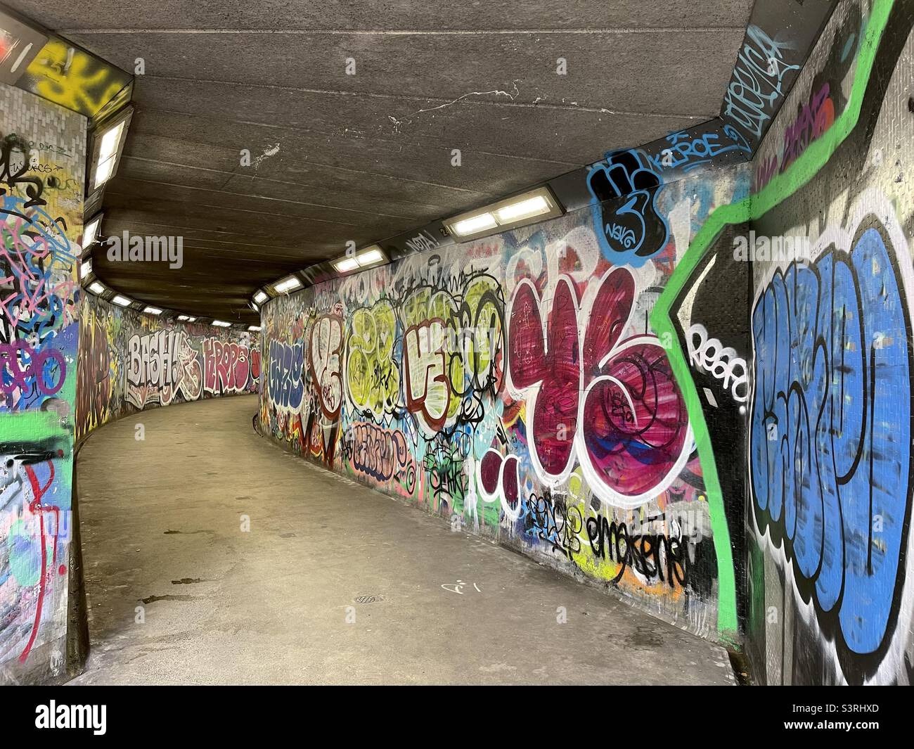 Subway under Victoria Street, Belfast. This subway connects High Street and Queen’s Square, curving around the foundations of the Albert Memorial Clock. - Smartphone Captured Stock Image