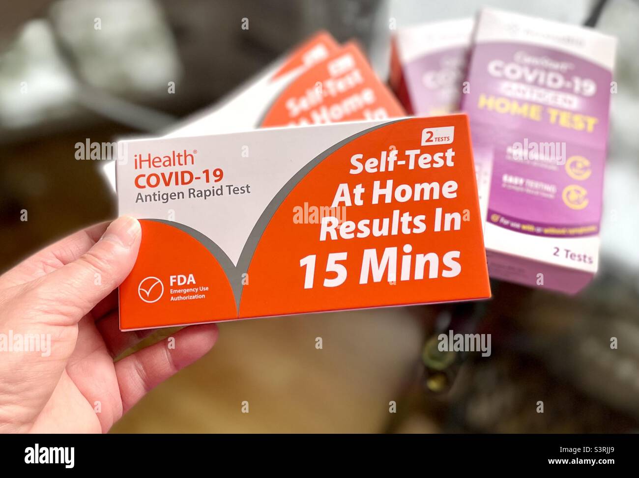 Virus prevention, COVID-19 rapid testing kits, at home 15 minute results. - Smartphone Captured Stock Image