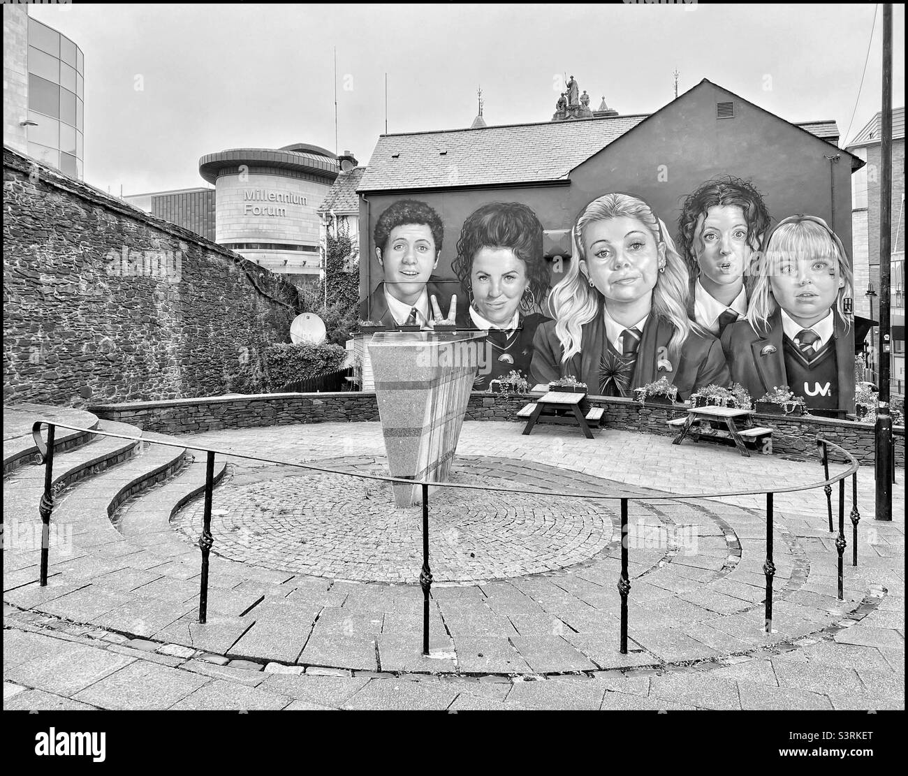The famous painting of “The Derry Girls” on the wall of Badgers Bar & Restaurant in Derry, N.I. These actors feature one of the most successful UK Channel 4 TV Series of all time. Pic ©️ COLIN HOSKINS Stock Photo