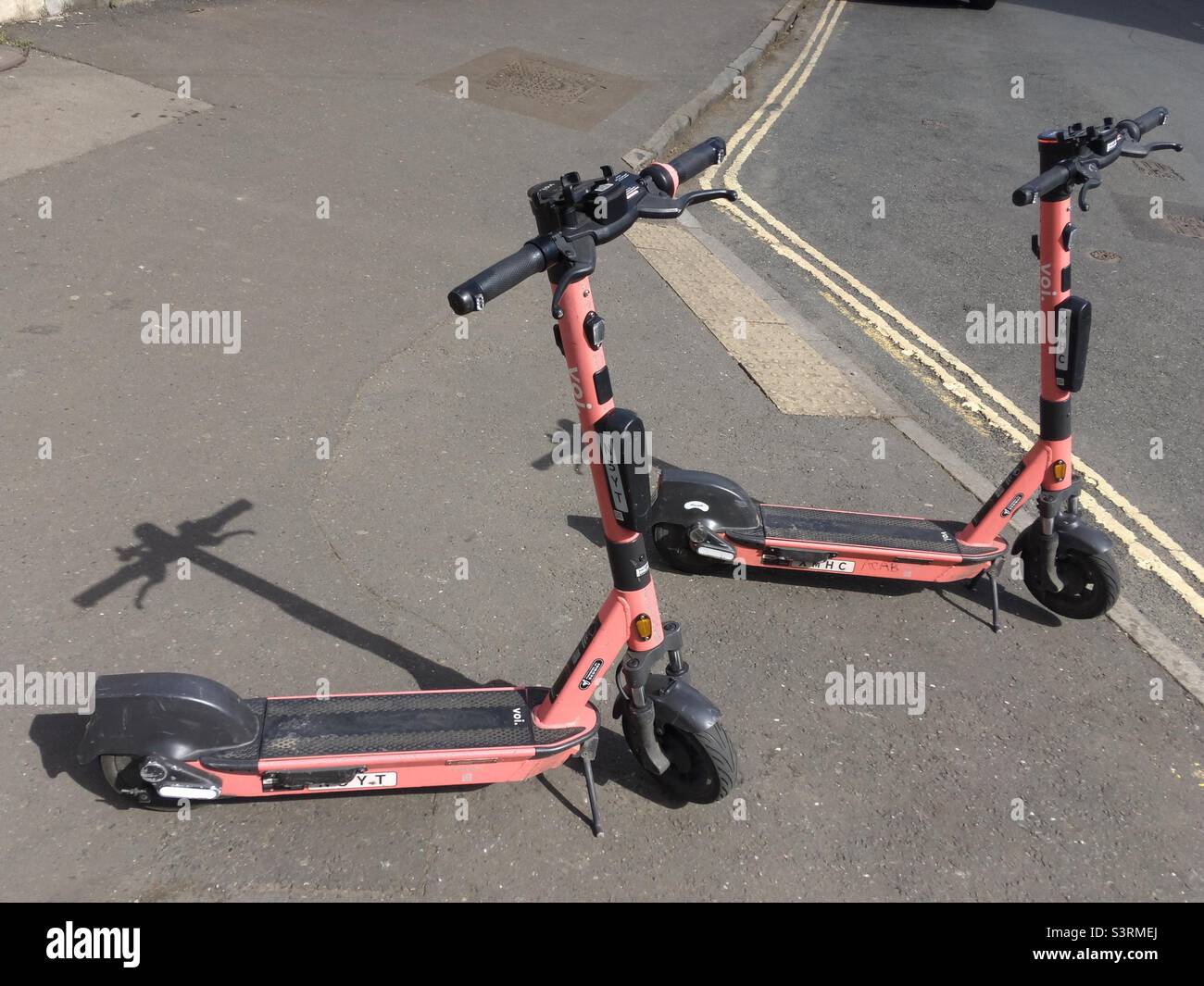 May 2022, Bristol, UK Voi electric scooters parked on the pavement