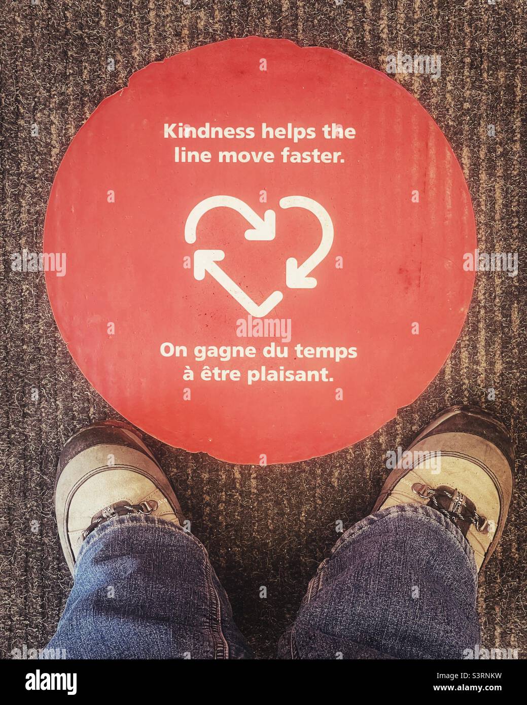 Signage- Kindness helps the line move faster. - Smartphone Captured Stock Image