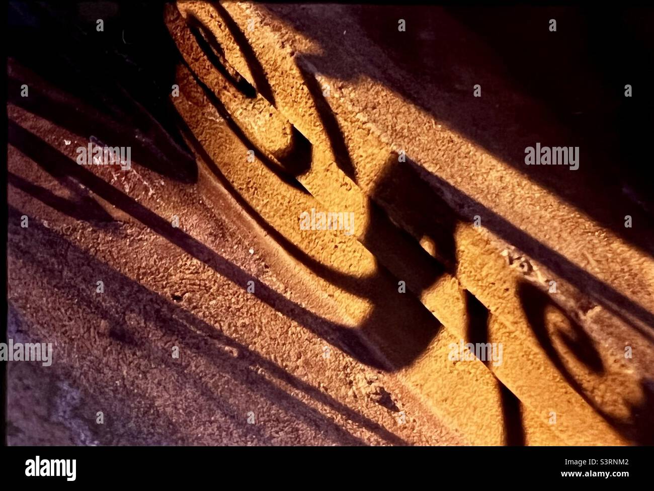 Shadow of railing on building Golden light - Smartphone Captured Stock Image