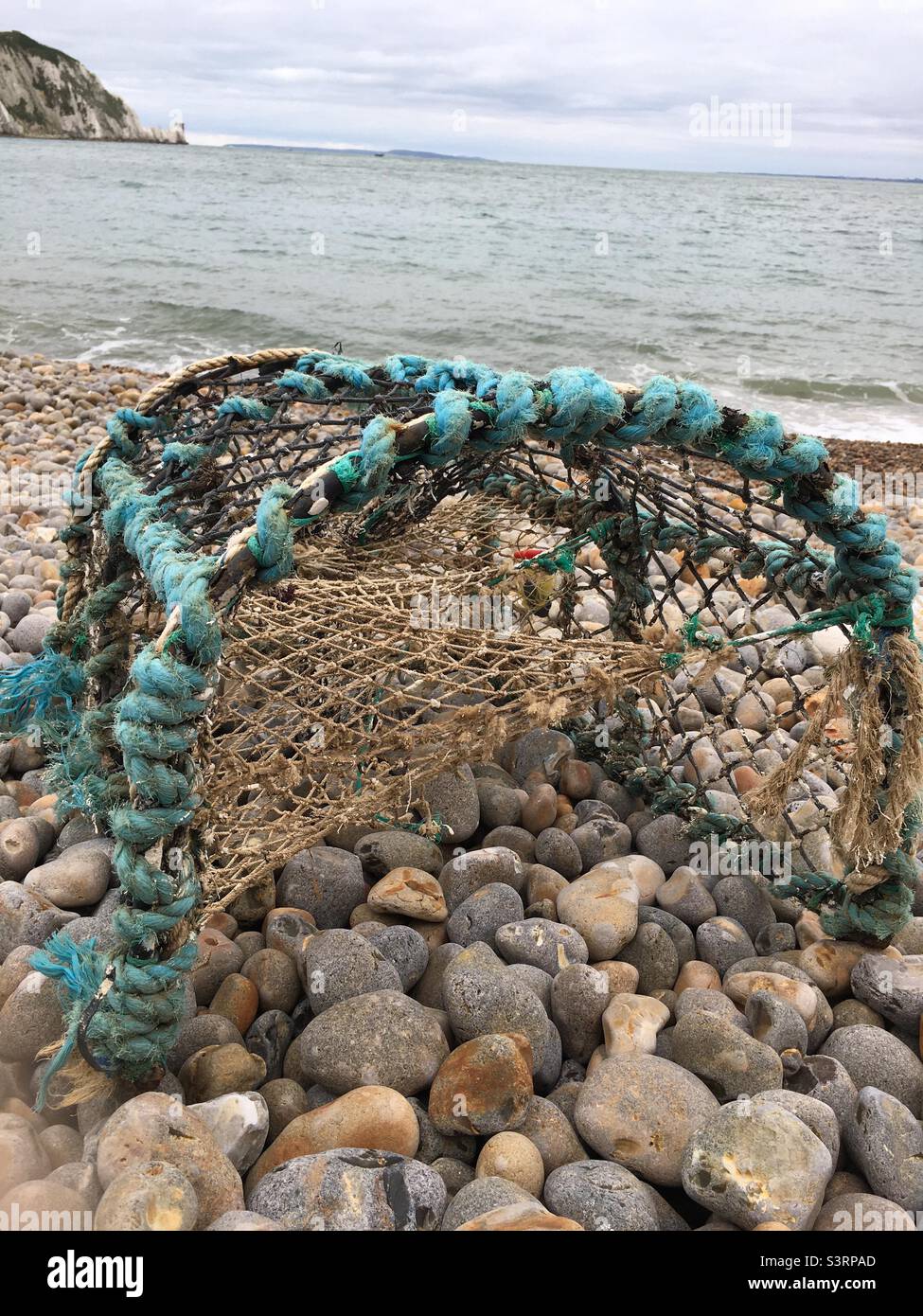 Crab basket on beach Stock Photo Alamy