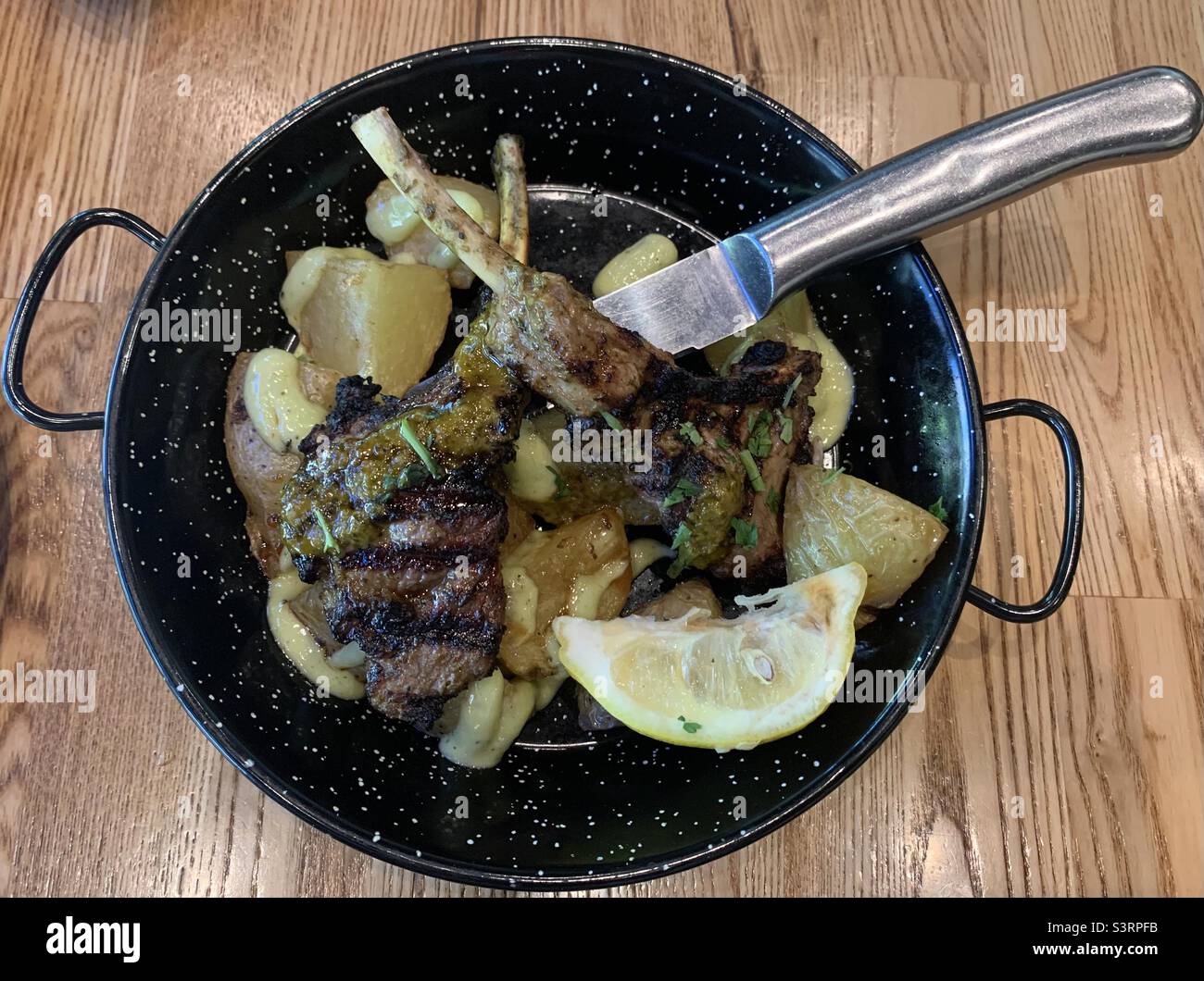 Lamb chops with potatoes Stock Photo Alamy