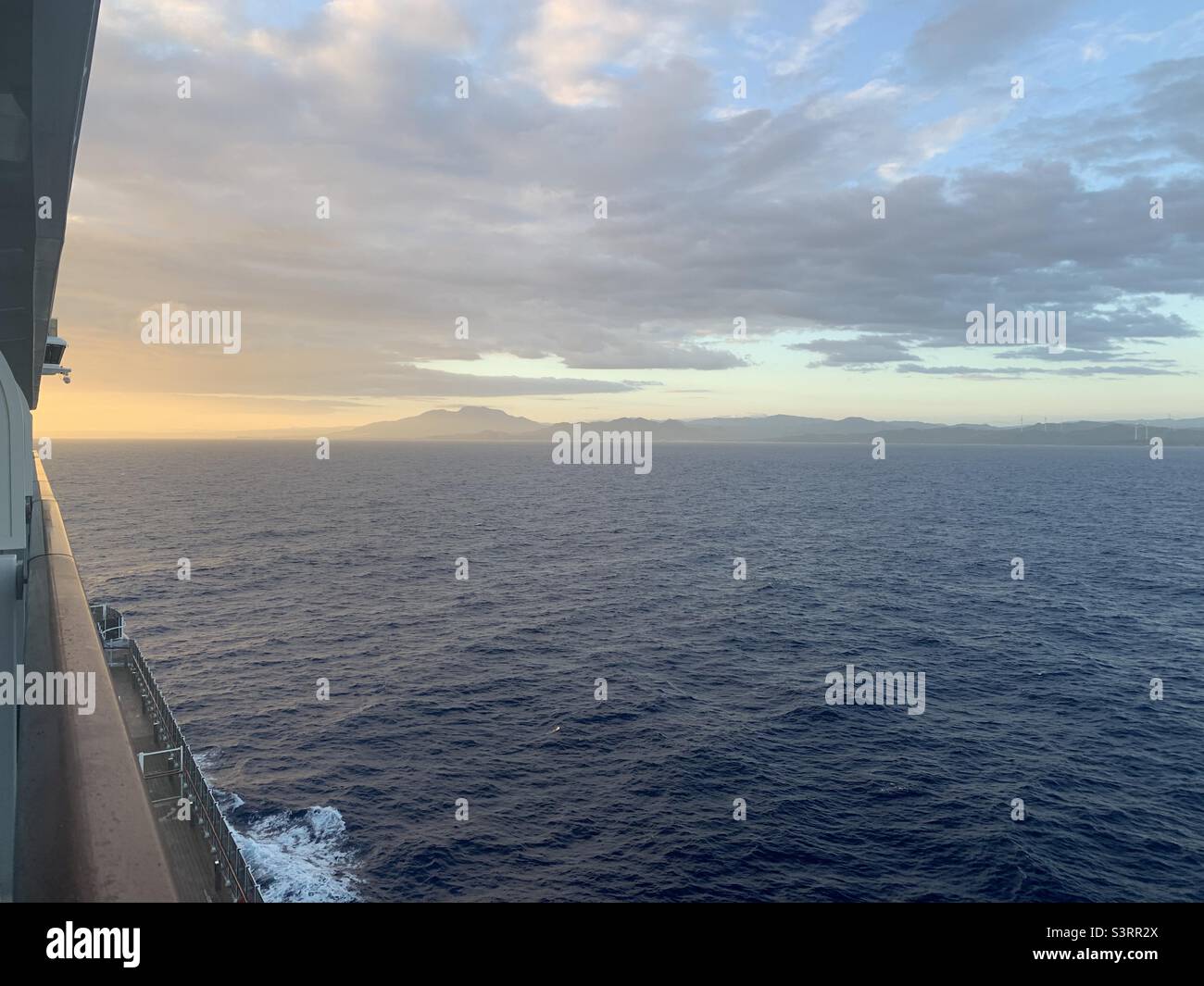 March, 2022, sunrise from the balcony of a cruise ship approaching the Dominican Republic Stock Photo