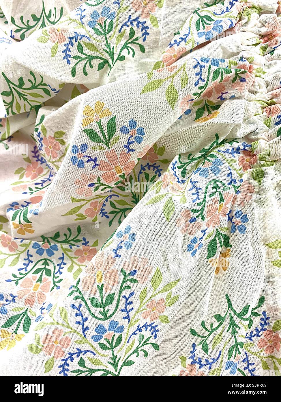Womens slept on floral bedsheets - Smartphone Captured Stock Image
