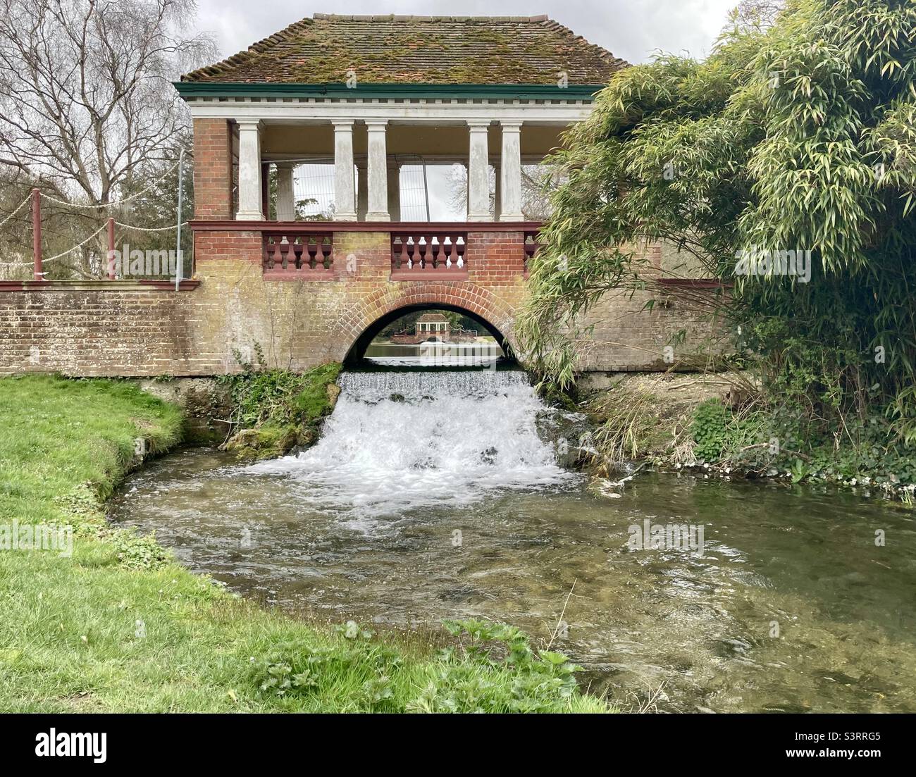 Pagoda style bridges over a lake in Russell gardens, kent. - Smartphone Captured Stock Image