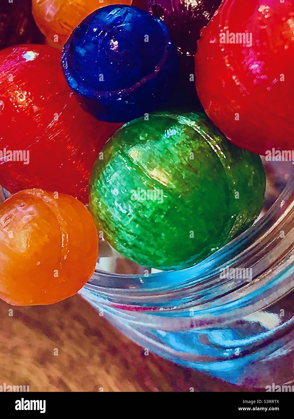Jar filled with colorful lollipops - Smartphone Captured Stock Image