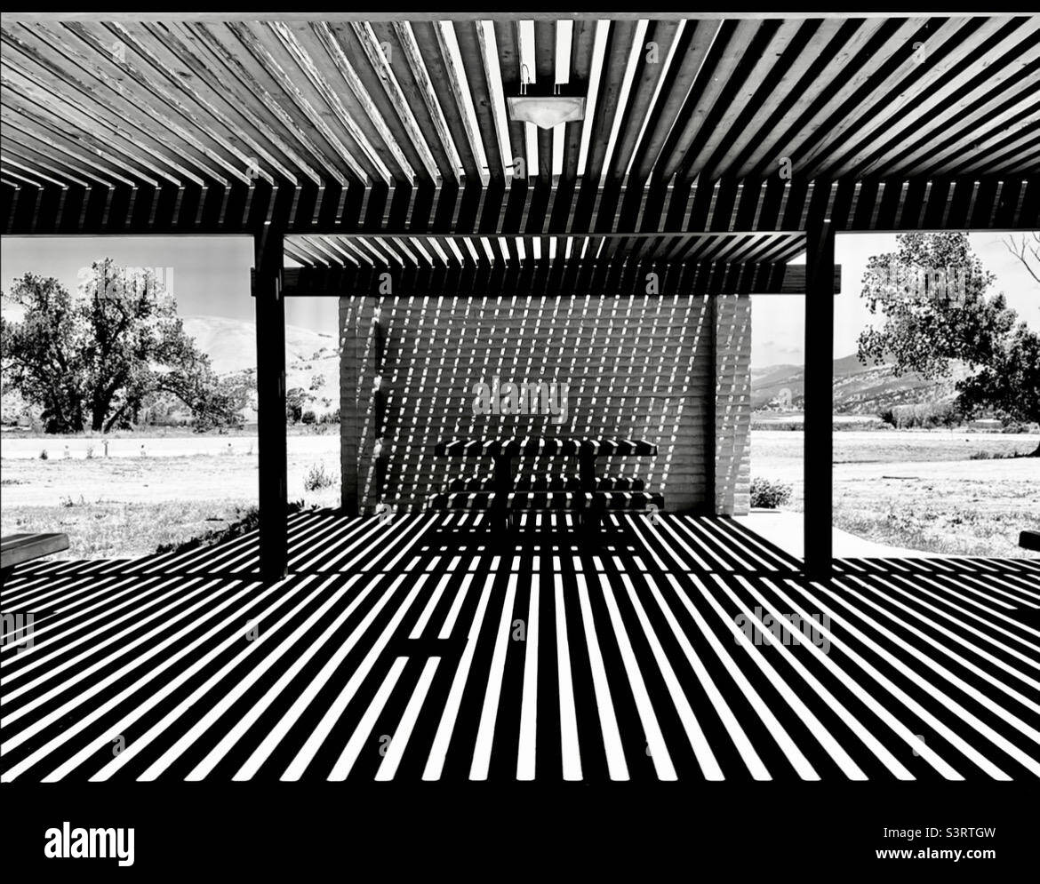 Shaded picnic bench at highway rest stop - Smartphone Captured Stock Image