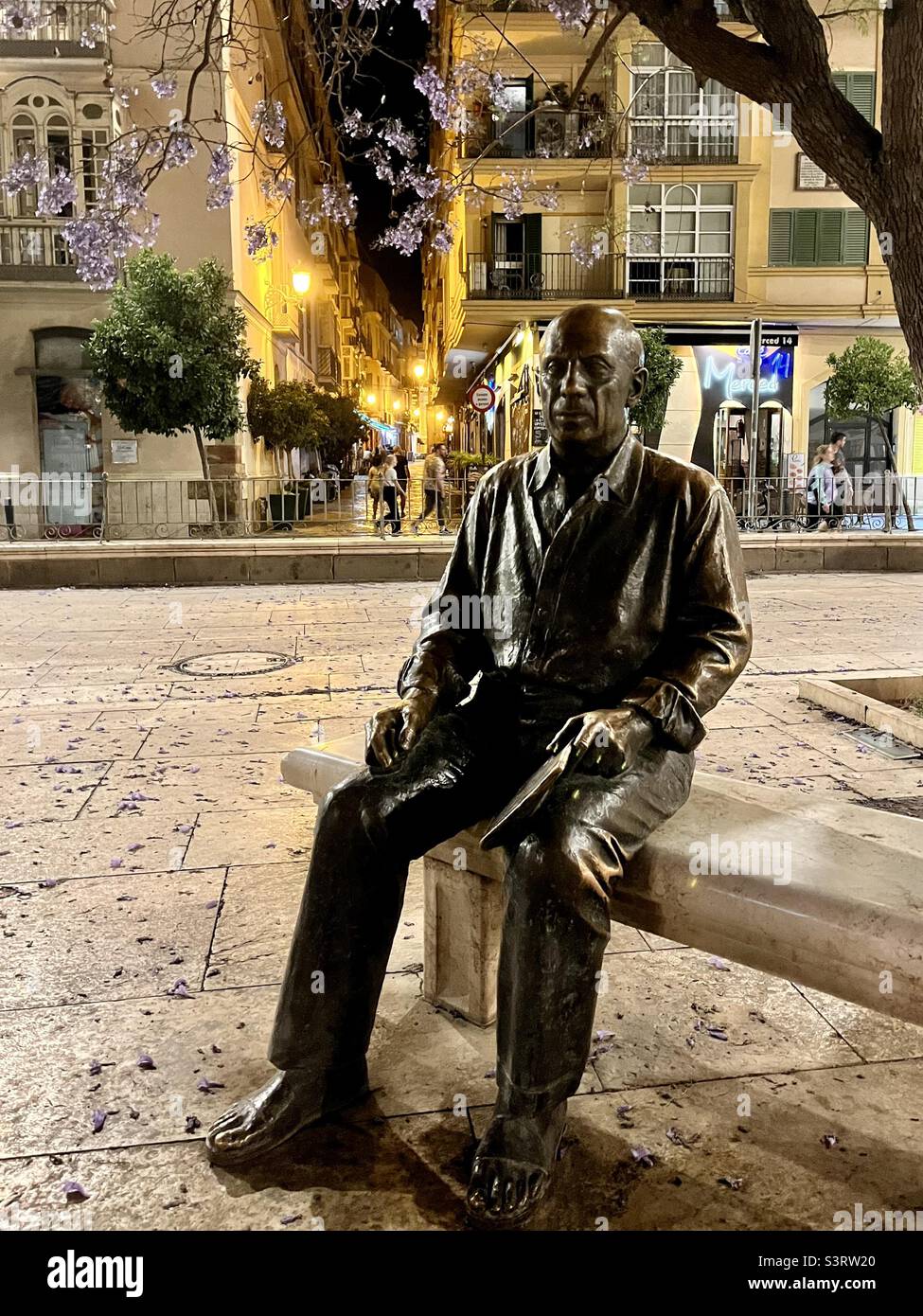 Sculpture of a man, Picasso, Plaza de la Merced, Malaga, Spain Stock Photo