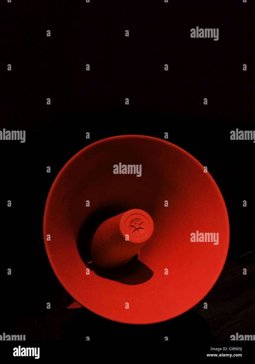 A red loudspeaker - Smartphone Captured Stock Image