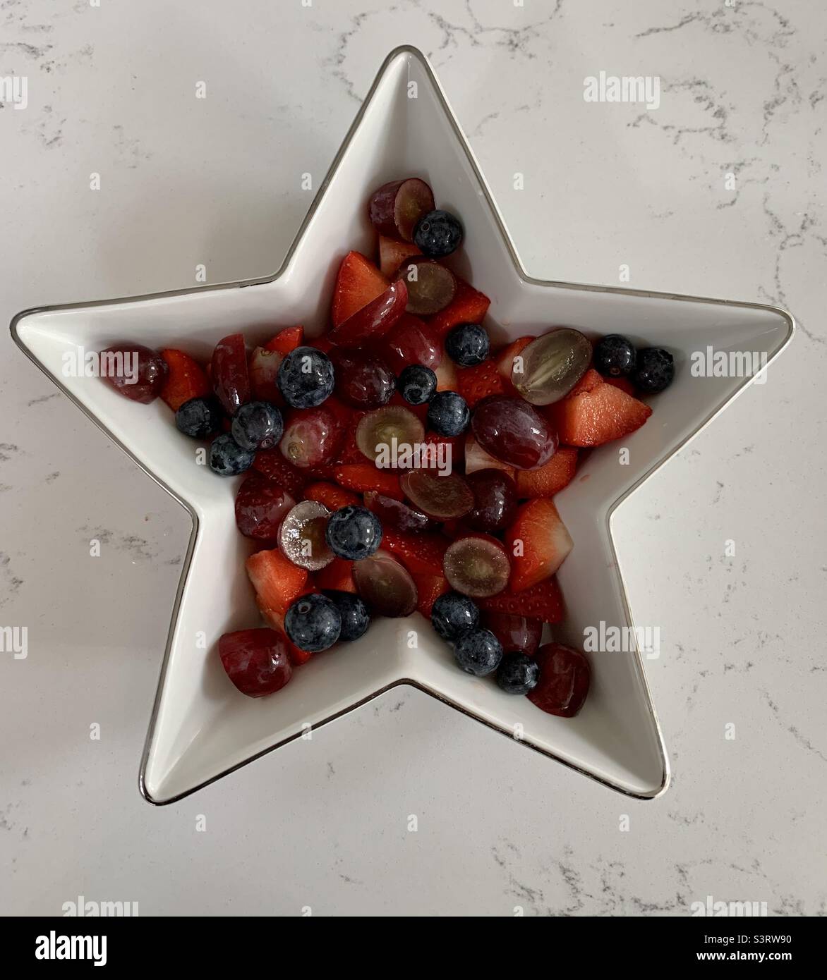 Healthy Berries in star shaped bowl - Smartphone Captured Stock Image