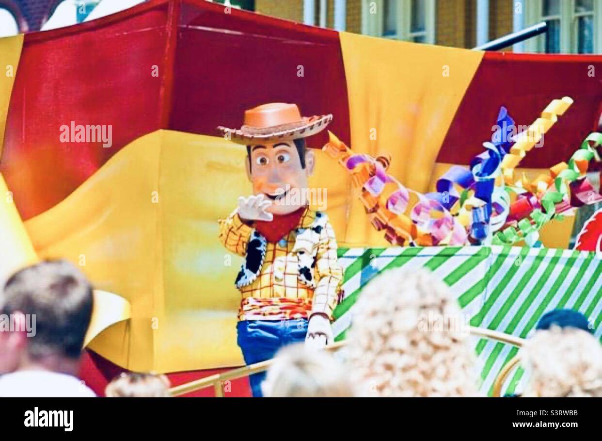 Woody from Toy Story waving to the crowd - Magic Kingdom, Walt Disney World, Orlando, USA Stock Photo