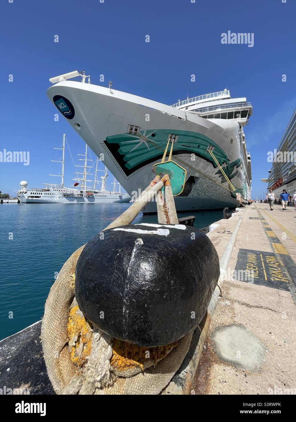 Mooring ropes holding the Norwegian Jade cruise ship at the quayside in Kusadasi, Turkey Stock Photo