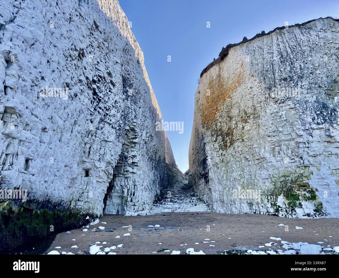 Pathway Down to the beach cut through a chalk cliff - Smartphone Captured Stock Image