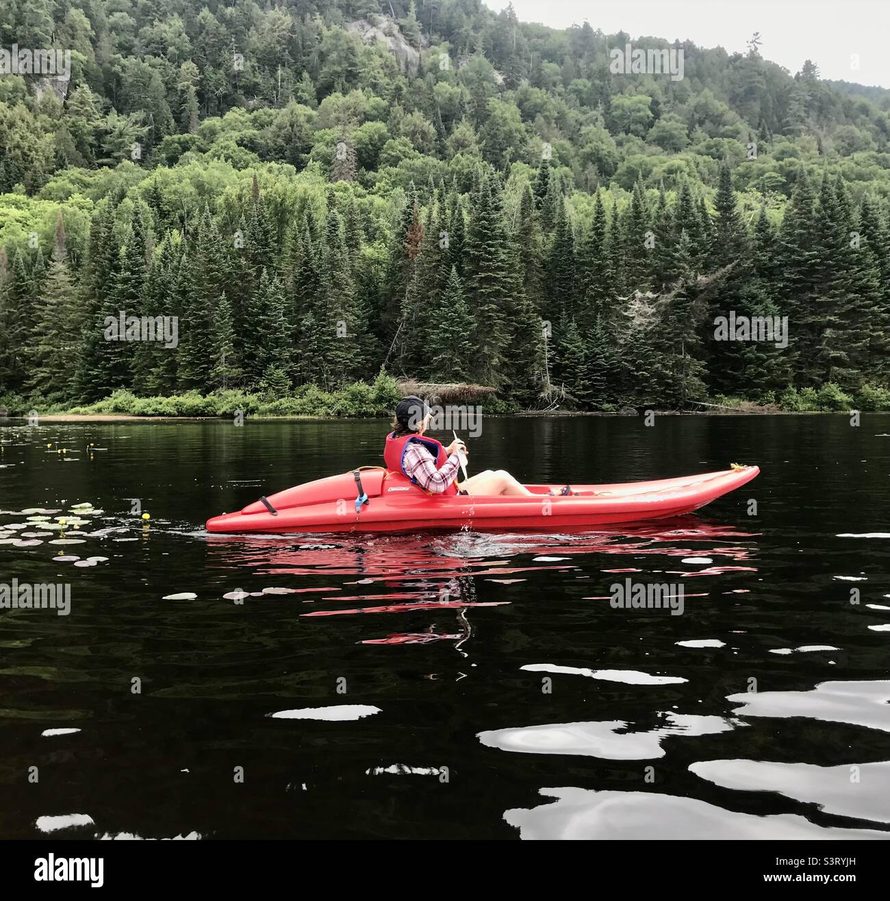 Lovely calm day for kayaking on Lac Monroe. - Smartphone Captured Stock Image