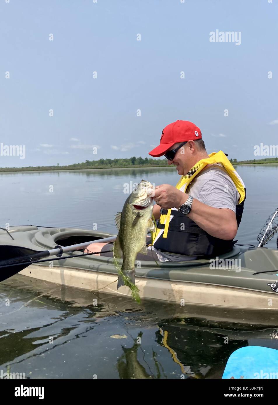 Decent largemouth bass on Constance Lake. - Smartphone Captured Stock Image