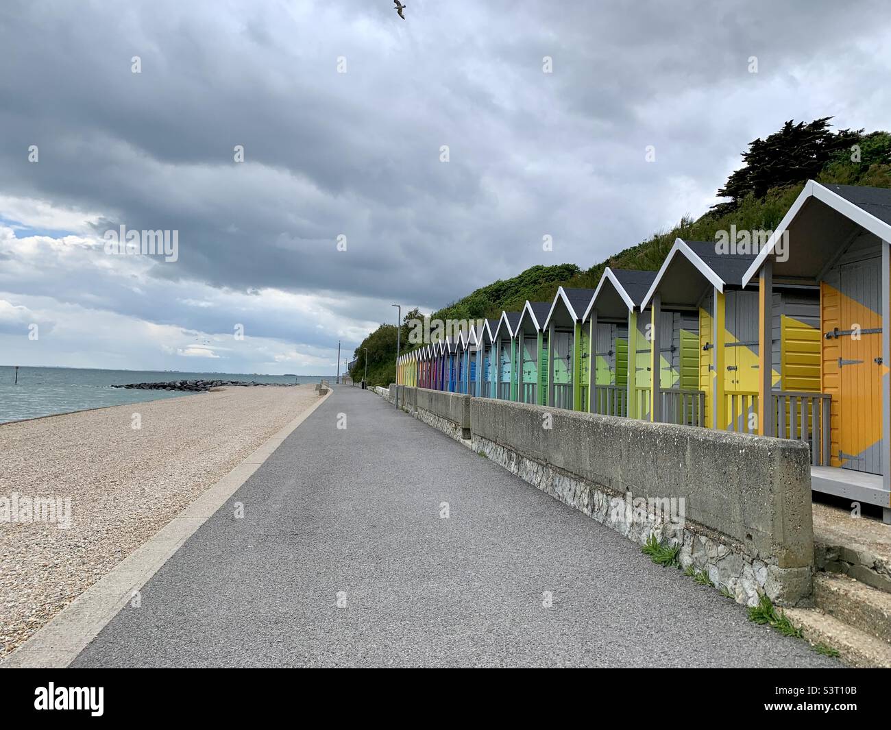 Colourful beach huts in Folkestone Stock Photo