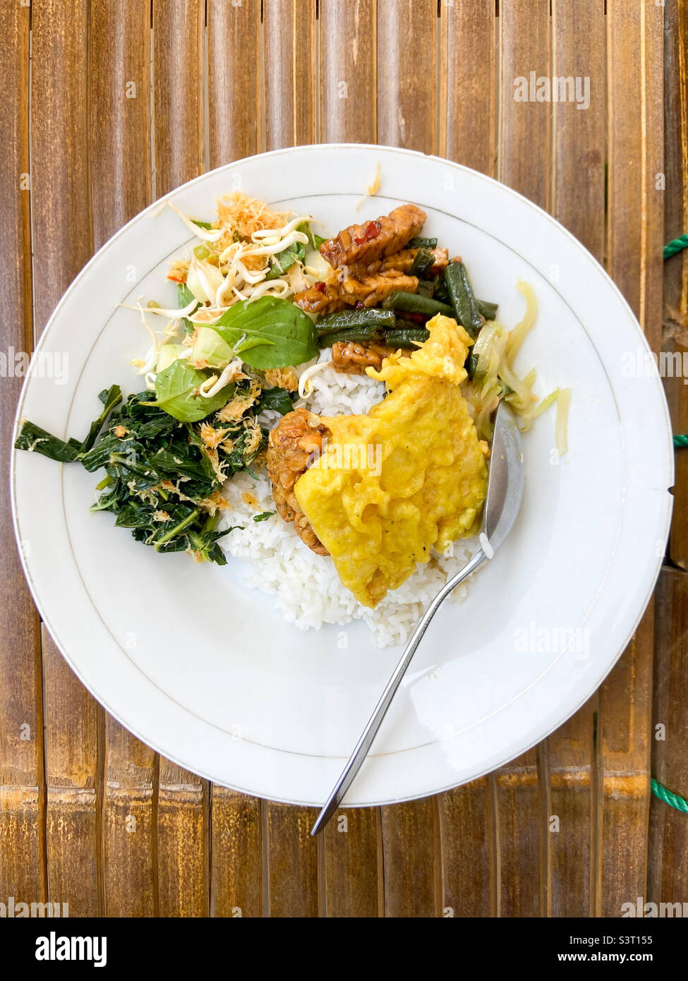 Nasi Campur ( a simple traditional food from java indonesia ) Stock Photo