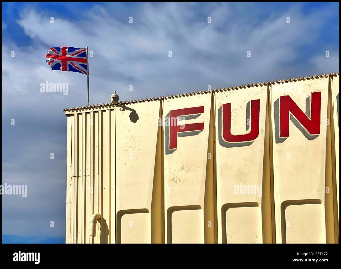 Fun and the Union Jack flag. A visual metaphor?!Photo ©️ COLIN HOSKINS. Stock Photo