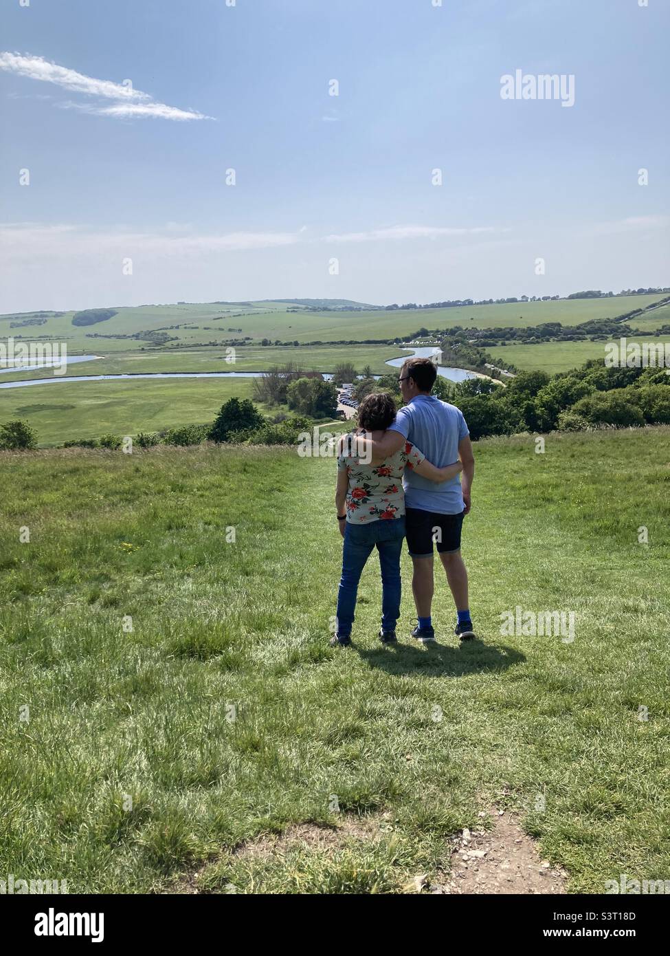 Couple looking at the view, Cuckmere Haven, East Sussex Stock Photo